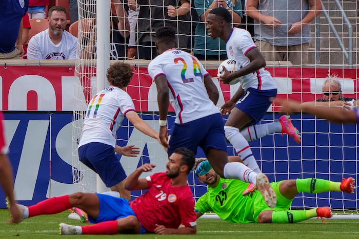 (Trent Nelson  |  The Salt Lake Tribune) United States forward Brenden Aaronson, United States forward Daryl Dike, and United States forward Tim Weah celebrate a goal by Aaronson as the U.S. Men’s National Team (USMNT) faces Costa Rica in a friendly at Rio Tinto Stadium in Sandy on Wednesday, June 9, 2021.