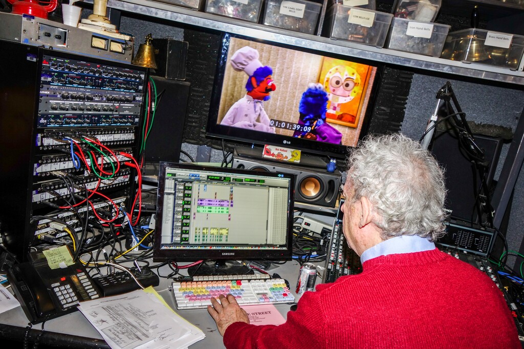 (Ariana McLaughlin | The New York Times) Dick Maitland, a foley artist, works on the 46th season of “Sesame Street” at Kaufman Astoria Studios in New York, Dec. 15, 2025. The White House effort to cut funding for NPR and PBS is beginning to take effect. The Corporation for Public Broadcasting, which backs NPR and PBS, said in a statement on Tuesday, May 6, 2025, that the Department of Education had terminated a federal grant program that funded shows for children.