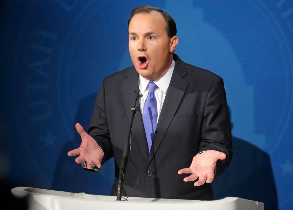 Republican Sen. Mike Lee, speaks with reporters after squaring off in a debate with Democratic challenger Misty Snow at Brigham Young University Wednesday, Oct. 12, 2016, in Provo, Utah. Lee and his Democratic challenger Snow meet Wednesday night in their first and likely only debate this year as Lee, Utah's junior senator, makes his first re-election run. (AP Photo/Rick Bowmer, Pool)