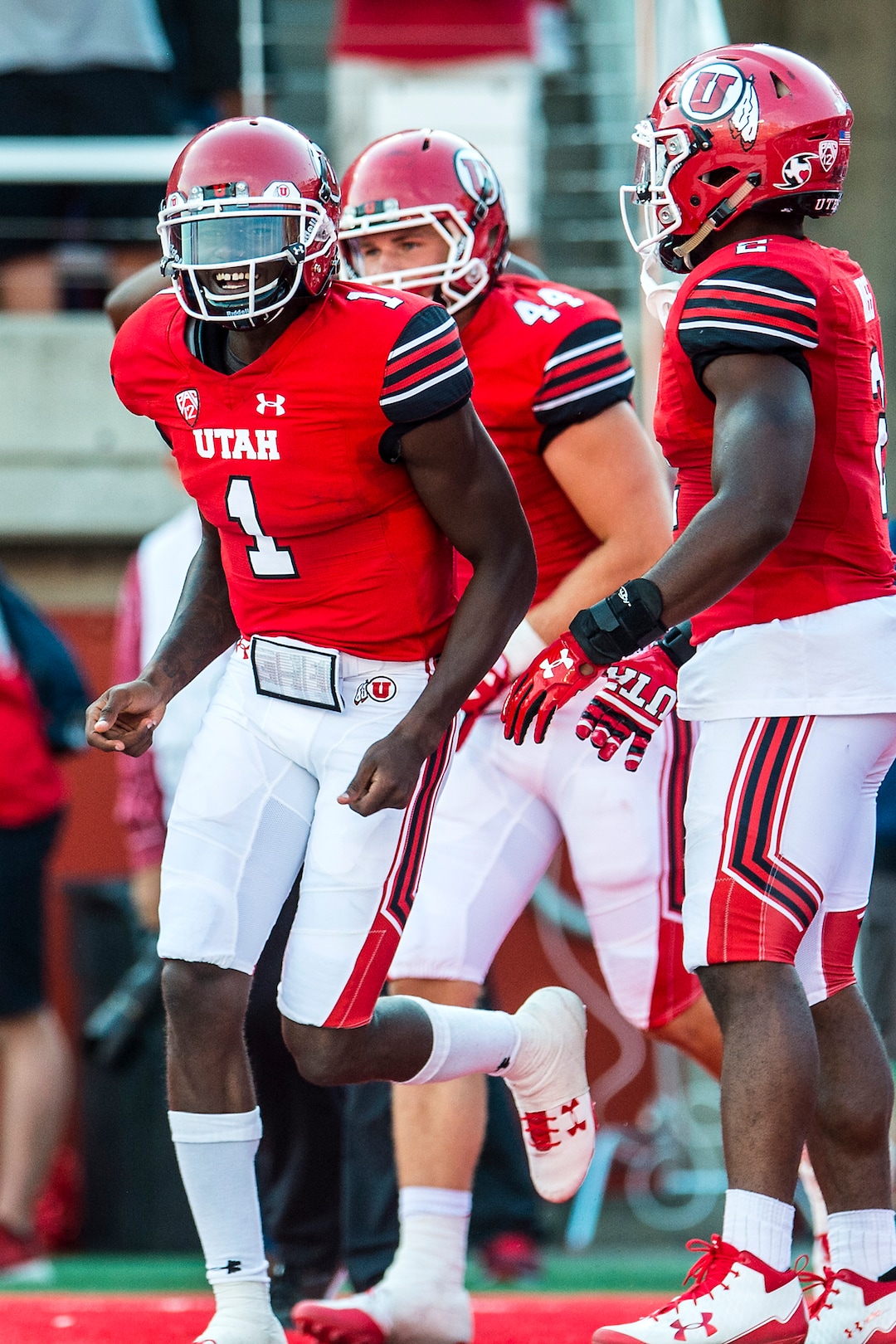 (Chris Detrick  |  The Salt Lake Tribune)  Utah Utes quarterback Tyler Huntley (1) celebrates his touchdown during the game at Rice-Eccles Stadium Thursday, August 31, 2017. Utah Utes are leading North Dakota Fighting Hawks 17-9 at halftime. 