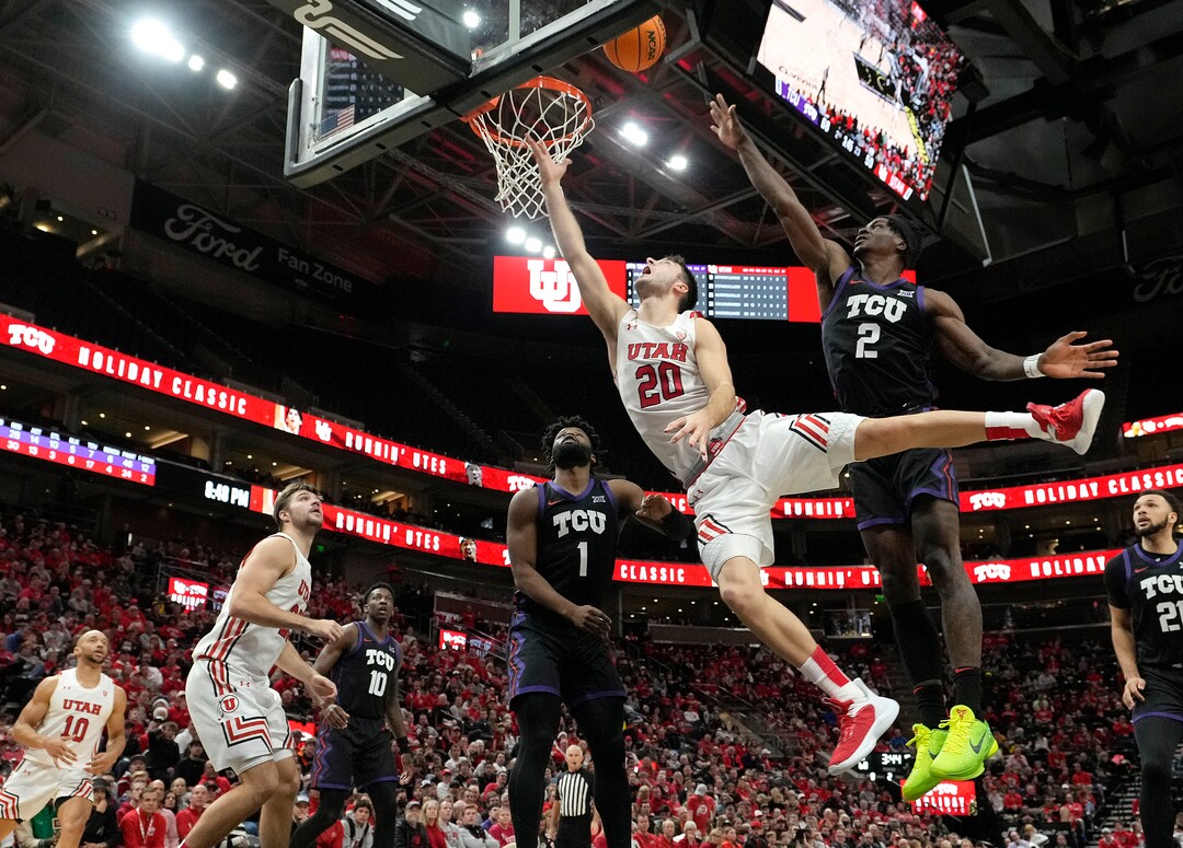 (Leah Hogsten | The Salt Lake Tribune) Utah Utes guard Lazar Stefanovic (20) for a bucket in the second half as the University of Utah hosts the TCU Horned Frogs at Vivint Arena, Dec. 21, 2022. 