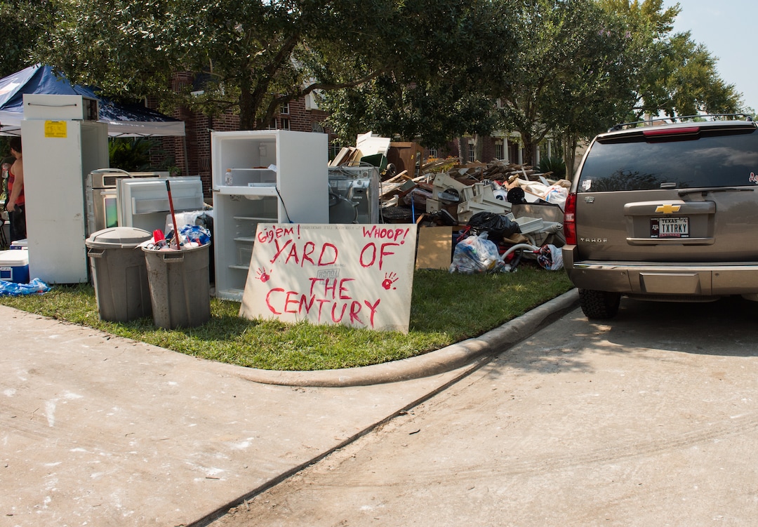 (Rachel Molenda  |  The Salt Lake Tribune) Residents of Wimbledon Estates in Spring, Texas, pile belongings and the interior of homes in yards following Hurricane Harvey on Sunday, Sept. 3, 2017. Members of the LDS Church in Houston were in the neighborhood assisting resideints with cleanup after Hurricane Harvey on Sunday, Sept. 3, 2017.