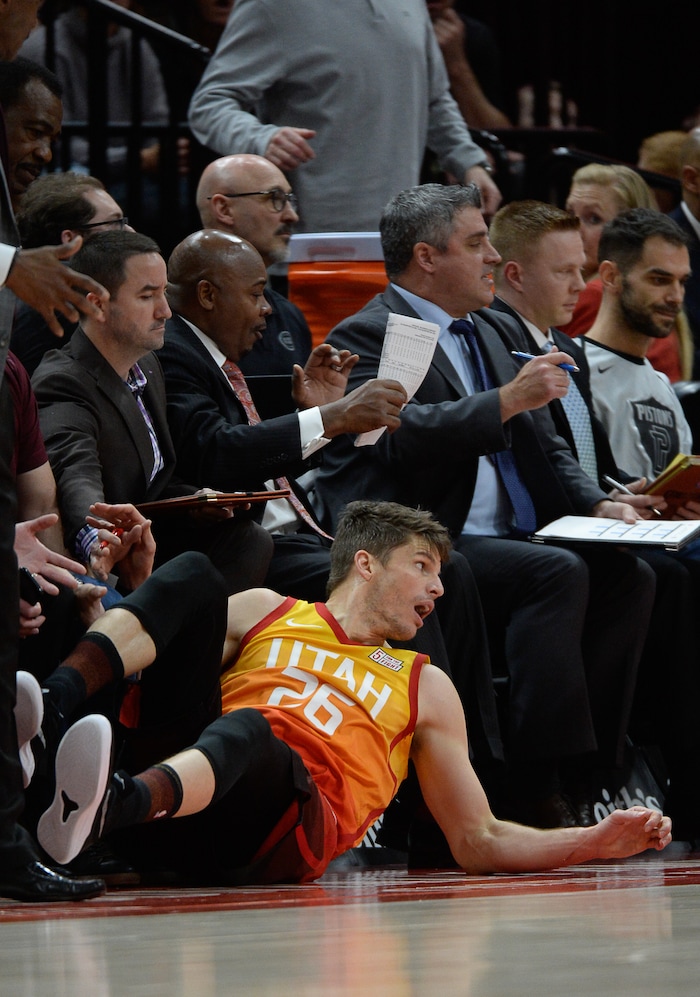 (Francisco Kjolseth  |  The Salt Lake Tribune)  Utah Jazz guard Kyle Korver (26) slides into the Pistons bench in the first half of their NBA game at Vivint Smart Home Arena Monday, Jan. 14, 2019, in Salt Lake City.