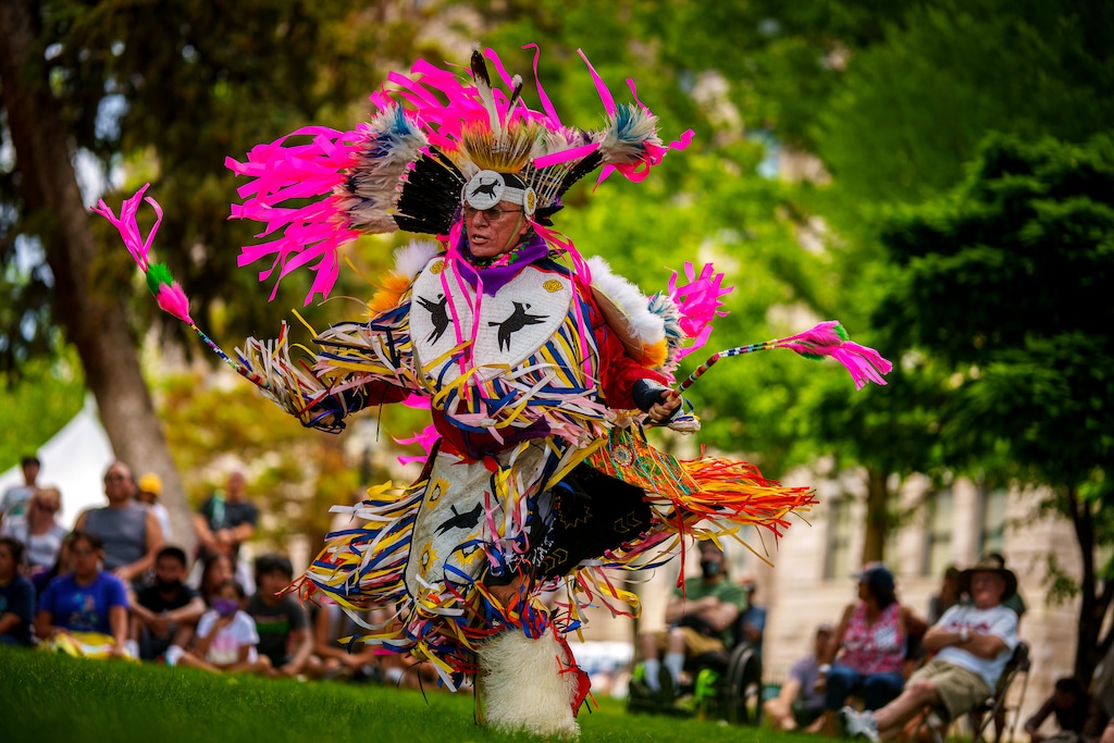 (Trent Nelson | The Salt Lake Tribune) Shon Taylor performs a fancy dance during an intertribal pow wow at the Living Traditions festival in Salt Lake City on Saturday, June 26, 2021. The festival will return to its regular schedule in 2022.
