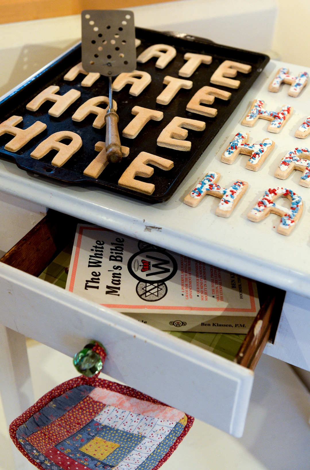 Leah Hogsten  |  The Salt Lake Tribune  "The Cooling Table" by Miguel Guillen, Seattle, Washington, mixed media, 2007 at the exhibit, "Speaking Volumes: Transforming Hate," opening Friday, June 15 at the Ogden Union Station Museum. The exhibit showcases 30 artists who transformed white-supremacist books into uplifting works of art.