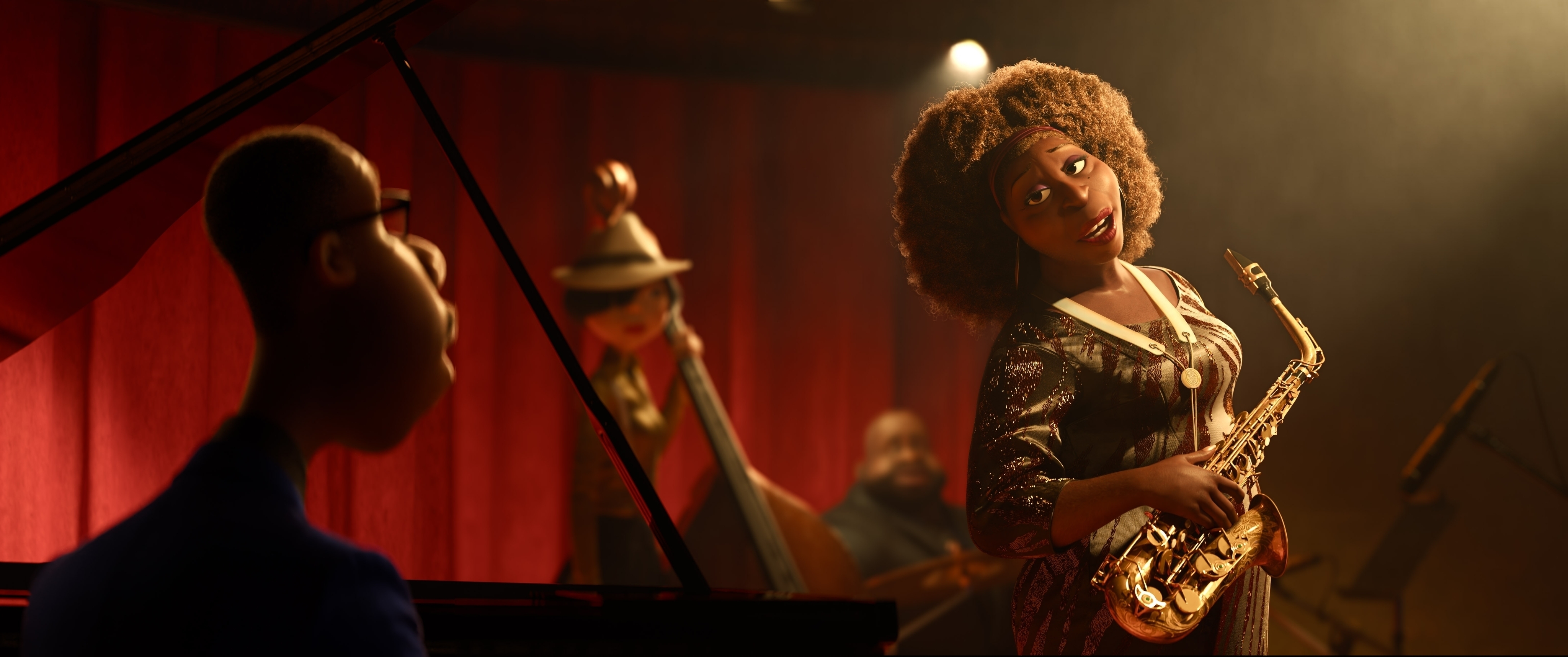 (Disney Pixar via AP) This image released by Disney-Pixar shows the character Joe Gardner, voiced by Jamie Foxx, left, and Dorothea Williams, voiced by Angela Bassett, in a scene from the animated film "Soul."