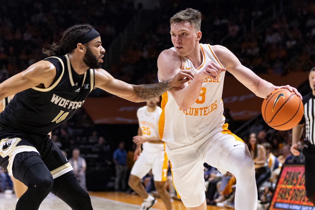 Tennessee guard Dalton Knecht (3) drives against Wofford guard Corey Tripp (10) during the second half of an NCAA college basketball game Tuesday, Nov. 14, 2023, in Knoxville, Tenn. (AP Photo/Wade Payne)