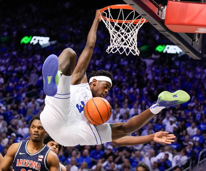 (Francisco Kjolseth | The Salt Lake Tribune) BYU Cougars forward AJ Dybantsa (3) makes a dunk as BYU hosts Arizona, NCAA basketball in Provo on Jan. 26. Dybantsa declared for the NBA Draft on Thursday.