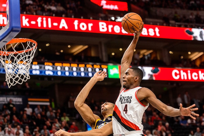 (Trent Nelson | The Salt Lake Tribune)  Portland Trail Blazers forward Maurice Harkless (4) drives on Utah Jazz center Rudy Gobert (27) as the Utah Jazz host the Portland Trail Blazers, NBA basketball in Salt Lake City, Wednesday November 1, 2017.