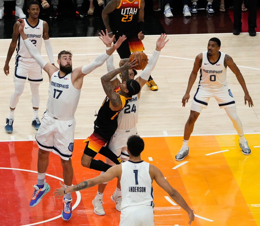 (Francisco Kjolseth | The Salt Lake Tribune) Utah Jazz guard Jordan Clarkson (00) gets tangled in the Memphis defense in the first half of Game 5 of an NBA basketball first-round playoff series Wednesday, June 2, 2021, in Salt Lake City, UT.