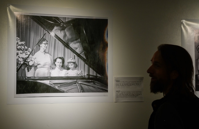 (Francisco Kjolseth  |  The Salt Lake Tribune)  Visual artist Dave Brewer, co-owner of the historic 2016 Ladies Literary Club House building at 850 E South Temple, currently known at the Photo Collective Studios gives a tour of the current photo exhibit documenting club. Brewer and his partner are now seeking a grant to make it ADA accessible for the first time in its 106-year history. To publicize their cause, on Tuesday, Sept. 24, 2019, they opened their refurbished building to tours.