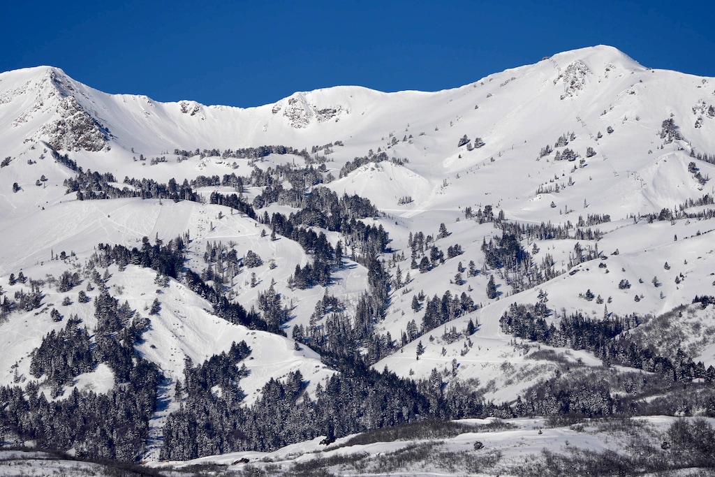 (Francisco Kjolseth | The Salt Lake Tribune) Two ski lifts are now visible at Wasatch Peaks Ranch, an exclusive community and private ski resort under development outside the hamlet of Peterson on Friday, April 7, 2023. The development, catering to richest ‘1% of the 1%’ about 17 miles from Ogden, is approved for 750 residential units, will come with a Tom Fazio golf course, a village and numerous amenities, including 70 miles of trails for residents’ exclusive use.