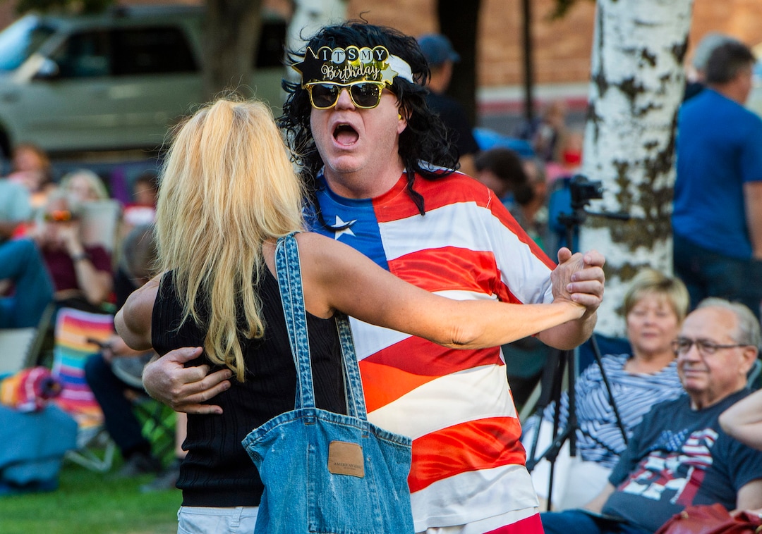(Rick Egan  |  The Salt Lake Tribune)   David Sheen sings along to “Hotel California” as he dances with Marie, on his 59th birthday, during the annual Geezerfest 2020, in Orem on Friday, Aug. 14, 2020.