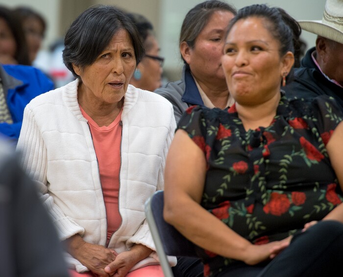 (Leah Hogsten  |  The Salt Lake Tribune)  l-r Mary Benally and her daughter Tara Benally react to the opinions of their fellow San Juan County residents concerning newly drawn redistricting lines in the county. San Juan County residents were presented with proposals of the newly redrawn county commission and school board districts during hearings in Monticello and Bluff, November 16, 2017. The redistricting proposals would redraw voting districts to ensure significant American Indian majorities in two of three County Commission districts and on four of five school board voting districts as the result of a January 2012 lawsuit filed in U.S. District Court by the Navajo Nation. The lawsuit seeks the redrawing of voting districts to reflect the 2010 U.S. Census. Last year, U. S. District Court Judge Robert Shelby ruled the voting districts in the sprawling southeastern Utah county, which today is home to 16,895 residents, are unconstitutional and violate the rights of American Indians. He ordered the county to redraw them.
