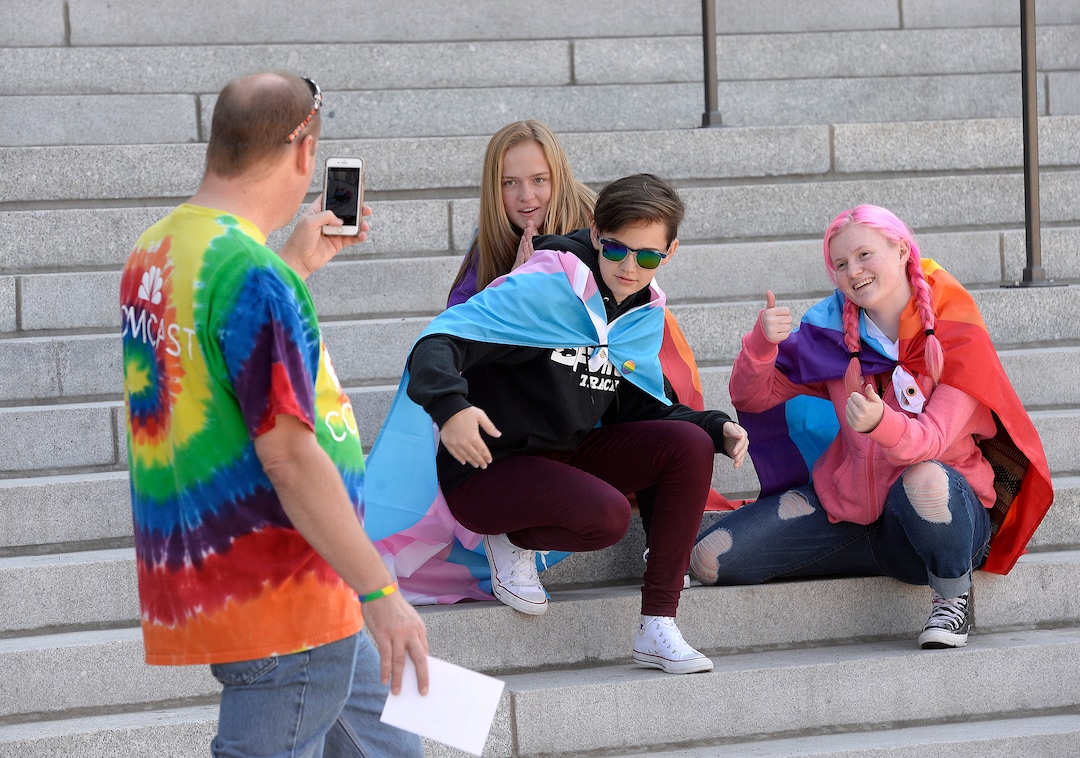 (Scott Sommerdorf   |  The Salt Lake Tribune)   Jason Stick makes a photo of Rachael Lindholm, Brinlee McKell and Julia Stick at the fifth annual Provo Pride Festival, Saturday, September 16, 2017.