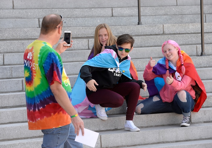 (Scott Sommerdorf   |  The Salt Lake Tribune)   
Jason Stick makes a photo of Rachael Lindholm, Brinlee McKell and Julia Stick at the fifth annual Provo Pride Festival, Saturday, September 16, 2017.