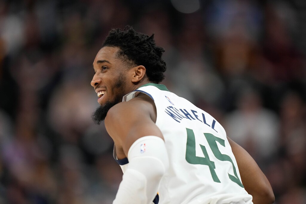 (Francisco Kjolseth | The Salt Lake Tribune) Utah Jazz guard Donovan Mitchell (45) celebrates a three pointer as the Utah Jazz host the Houston Rockets at Vivint Arena in Salt Lake City, Monday, Feb. 14, 2022.