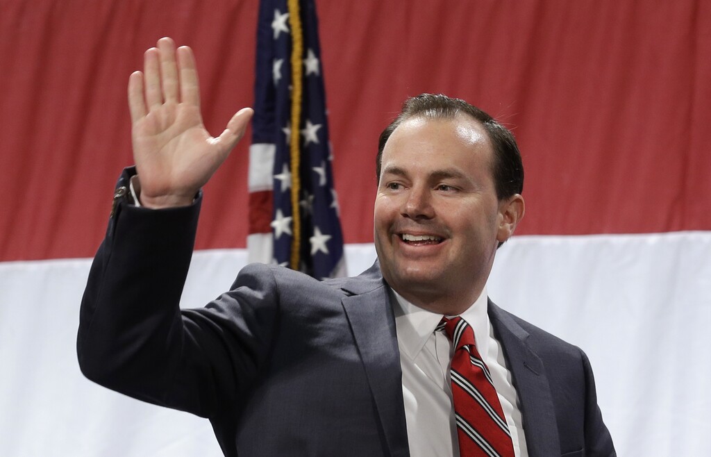 FILE - In this April 26, 2014, file photo, Sen. Mike Lee, R-Utah, waves during the Utah Republican Party nominating convention in Sandy, Utah. The conservative group Citizens United is launching an advertising campaign in Utah urging residents to call Lee and thank him for his conservative policies. (AP Photo/Rick Bowmer, File)