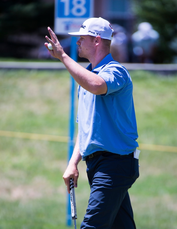 (Rick Egan  |  The Salt Lake Tribune)     Patrick Fishburn from Farr West, UT, waves to the crowd as he finishes 8 under par, in the second round of the Utah Championship golf event on the Web.com Tour at Oakridge Country Club in Farmington. July 13, 2018.


