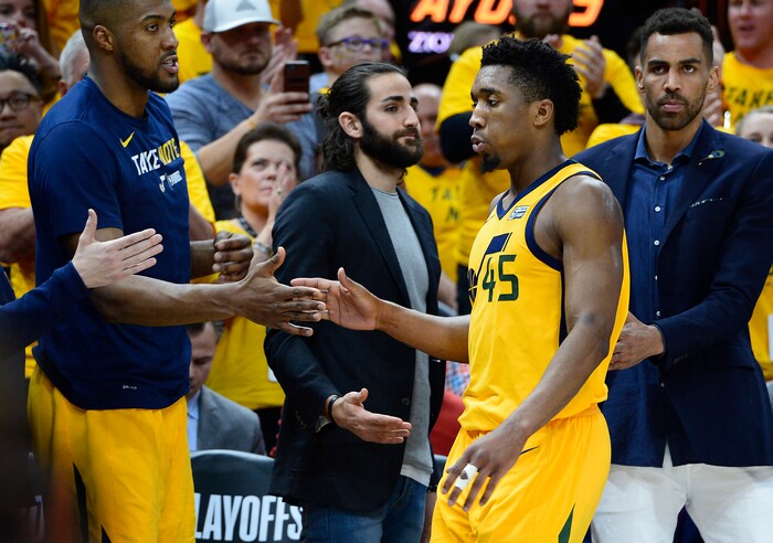 (Scott Sommerdorf | The Salt Lake Tribune)
Team mates including injured Utah Jazz guard Ricky Rubio (3), center, greet Utah Jazz guard Donovan Mitchell (45) after he fouled out of the game. The Rockets beat the Jazz 100-87, Sunday, May 6, 2018.
