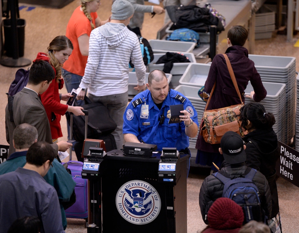 Al Hartmann  |  The Salt Lake Tribune
A TSA worker checks identification and boarding passes at Salt Lake International Airport. So far in 2019, TSA has intercepted 65 guns in carry-on bags at the airport.