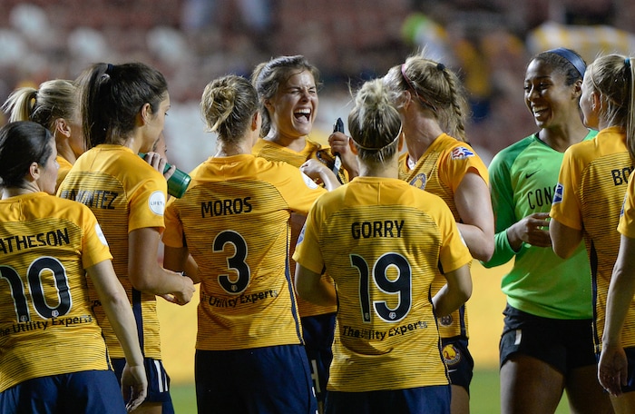 (Francisco Kjolseth  |  The Salt Lake Tribune)  Utah Royals FC hosts Washington Spirit, NWSL soccer at Rio Tinto Stadium in Sandy, Wed. Aug. 8, 2018. Utah Royals FC forward Katie Stengel (24) is celebrated as the player of the game after her winning goal 1-0. 