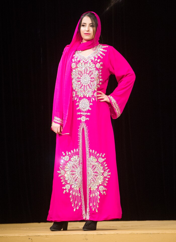 (Rick Egan  |  The Salt Lake Tribune)  Reem models an outfit from Iraq,at the 8th Annual Women of the World Fashion Show. The fashion show fund is raiser for the non-profit that seeks to help refugees settle in a new culture. Wednesday, March 7, 2018.