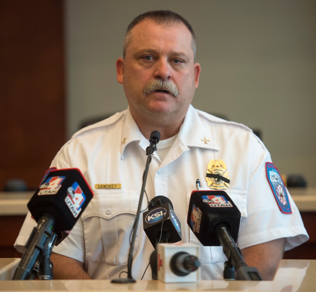 (Rick Egan  |  The Salt Lake Tribune)       Draper Fire Battalion Chief Bart Vawdrey speaks at a news conference at Draper City Hall about Matt Burchett, 42, who died fighting wildfires in California. Tuesday, Aug. 14, 2018.