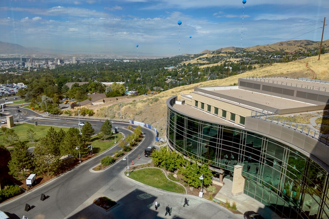 (Leah Hogsten  |  The Salt Lake Tribune) Blue balloons on the hillside of the Huntsman Cancer Institute’s campus mark the location of the Kathryn F. Kirk Center for Comprehensive Cancer Care and Women’s Cancers at Huntsman Cancer Institute, September 5, 2019. The new center will house a floor dedicated to women’s cancers, a new endoscopy center, increased services for blood and bone marrow transplant patients, an expanded HCI Wellness and Integrative Health Center and 48 new inpatient hospital rooms.
