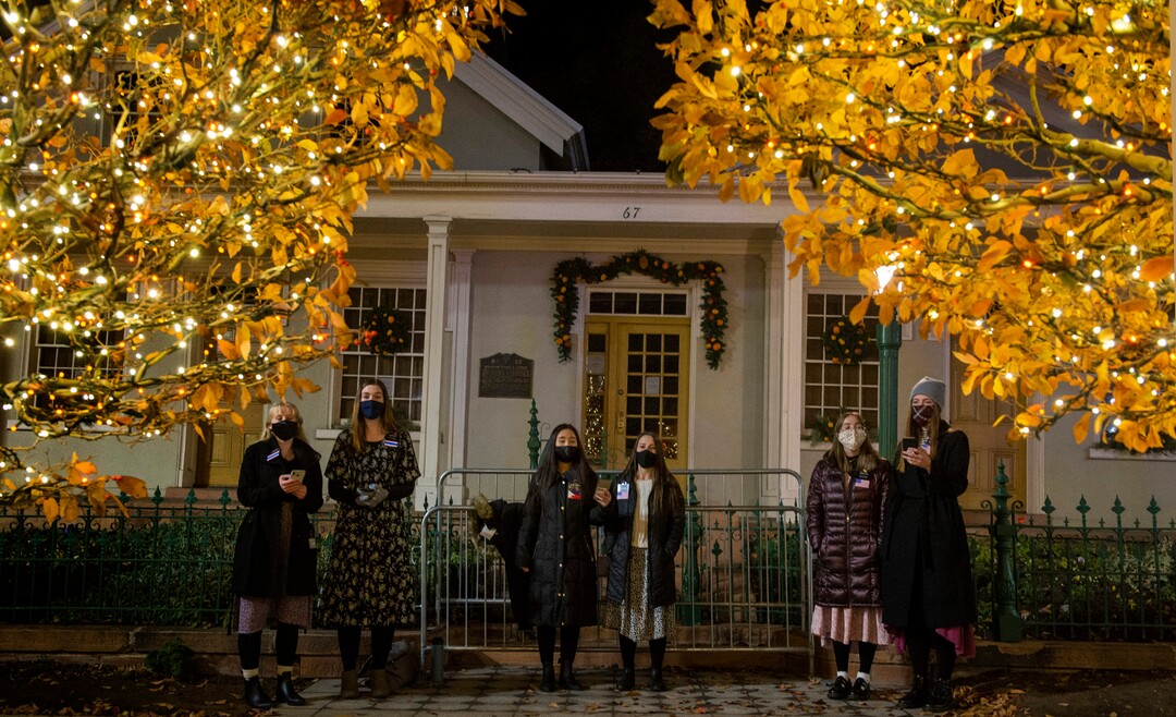 (Rick Egan | The Salt Lake Tribune)  Temple Square is closed, but sister missionaries sing Christmas carols in front of the Beehive House, in downtown Salt Lake City, Friday, Nov. 27, 2020.