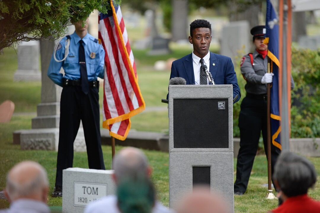 (Francisco Kjolseth  |  The Salt Lake Tribune)  Salt Lake City mayor’s office intern Ephraim Kum, reflects on the occasion in conjunction with the 400th anniversary of the arrival of African slaves in the United States, as he joins the dedication of the first grave marker for Tom, an enslaved Black pioneer who was buried in the Salt Lake City Cemetery in 1862.