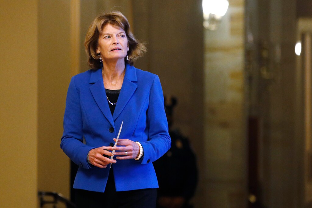 (Steve Helber | AP) Sen. Lisa Murkowski, R-Alaska, returns to the Senate chamber after a meeting in the Majority Leaders office during a break in the impeachment trial of President Donald Trump at the U.S. Capitol Friday Jan 31, 2020, in Washington.
