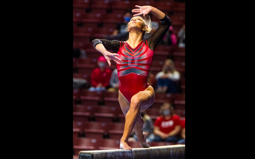 (Rick Egan | The Salt Lake Tribune) Abby Paulson competes on the beam for Utah in the Best of Utah gymnastics meet at the Maverik Center on Saturday, Jan. 9, 2021.