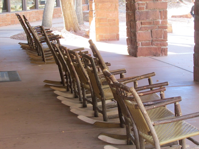 (Tom Wharton | The Salt Lake Tribune) The rocking chairs in front of the Zion National Park Lodge were empty Sunday morning, though the lodge was open. Park services have been reduced because of a federal government shutdown that went into effect at midnight Friday after the Senate was unable to pass a new spending bill.