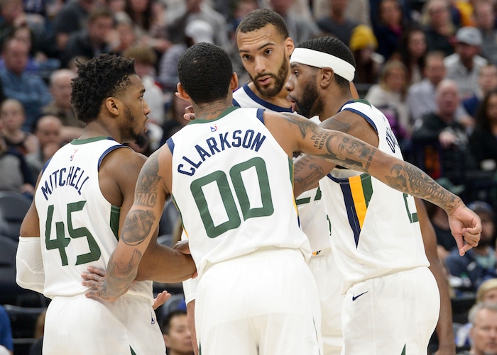 (Leah Hogsten  |  The Salt Lake Tribune) l-r Utah Jazz guard Donovan Mitchell (45), Utah Jazz guard Jordan Clarkson (00), Utah Jazz center Rudy Gobert (27) and Utah Jazz forward Royce O'Neale (23) try to get some momentum in the second half.  The Utah Jazz lost to the Houston Rockets 110-120 at Vivint Arena, Feb. 22, 2020.