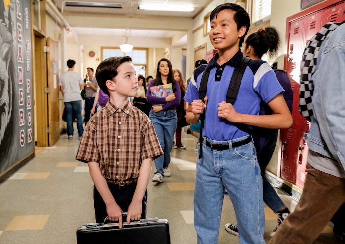 (Photo: Darren Michaels/Warner Bros.) Tam (Ryan Phuong) and Sheldon (Iain Armitage) in the school hallway on “Young Sheldon.”