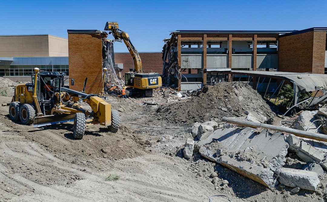 (Francisco Kjolseth  |  The Salt Lake Tribune)  Work begins tearing down the old West Jordan Middle School, 7550 S. Redwood Road, the oldest school in the Jordan School District on Tuesday, July 16, 2019.