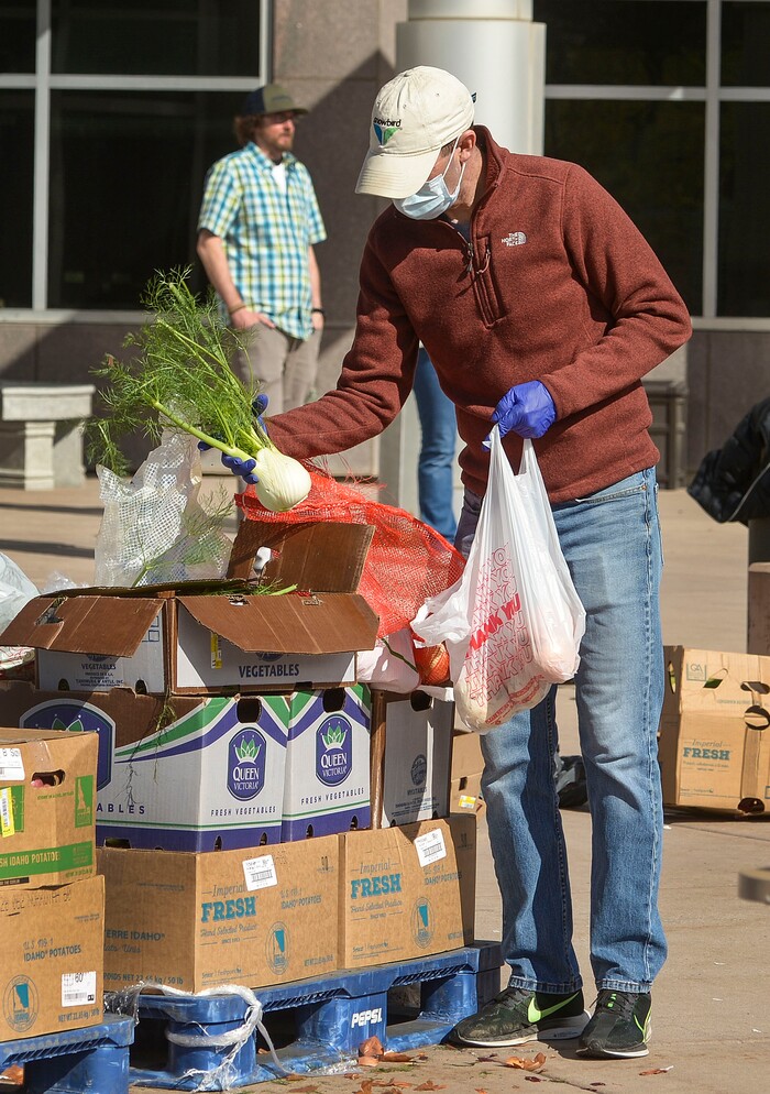 (Leah Hogsten  |  The Salt Lake Tribune)  Snowbird employees handed out over 10,000 pounds of perishable items from the ski resort's restaurants and stores to their workforce, March 21, 2020. The food included milk, eggs, bread, cheeses, every kind of herb, vegetable and fruit, including kumquats and lemon grass, and was given to Snowbird employees on a first-come, first-served basis.