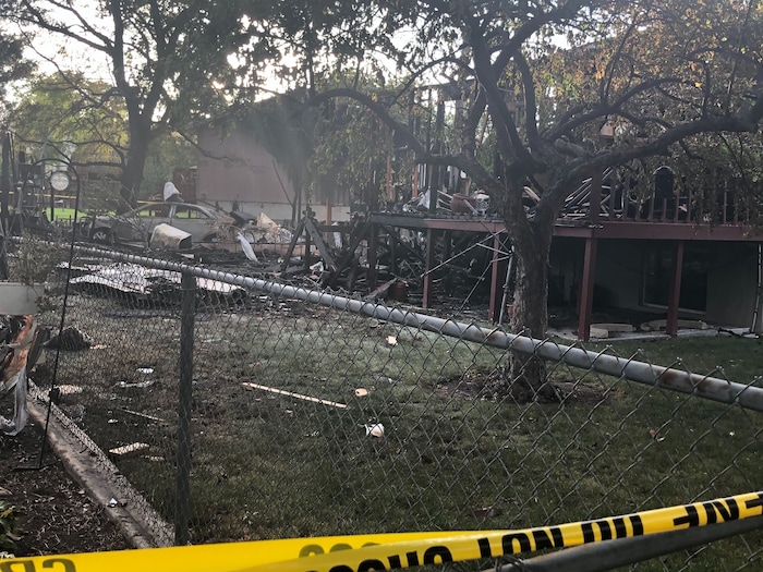 (Sydney Glenn | FOX 13) The crash site where a small plane with six passengers hit a home in West Jordan on Saturday, July 25, 2020.