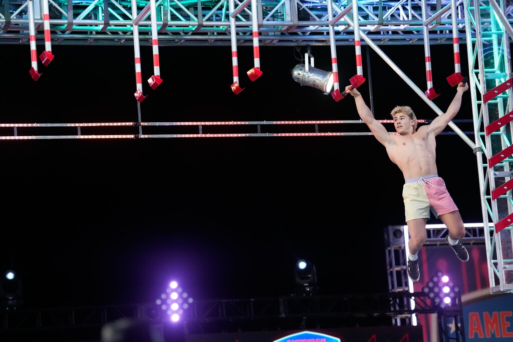 (Greg Gayne | NBC) Kai Beckstrand of St. George, Utah, conquers the floating monkey bars, one of the challenges on the obstacle course on the season finale of NBC's "American Ninja Warrior," which aired Aug. 25, 2025.