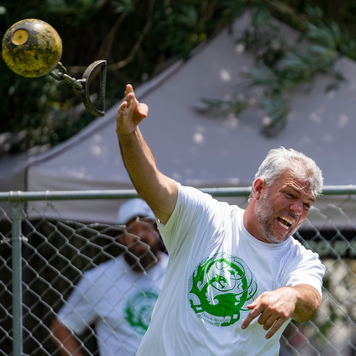 (Rick Egan | The Salt Lake Tribune) Erik Norman, from South Jordan,  competes in the Highland games Weight for Distance competition, at the Payson Scottish Festival, on Saturday, July 9, 2022.
