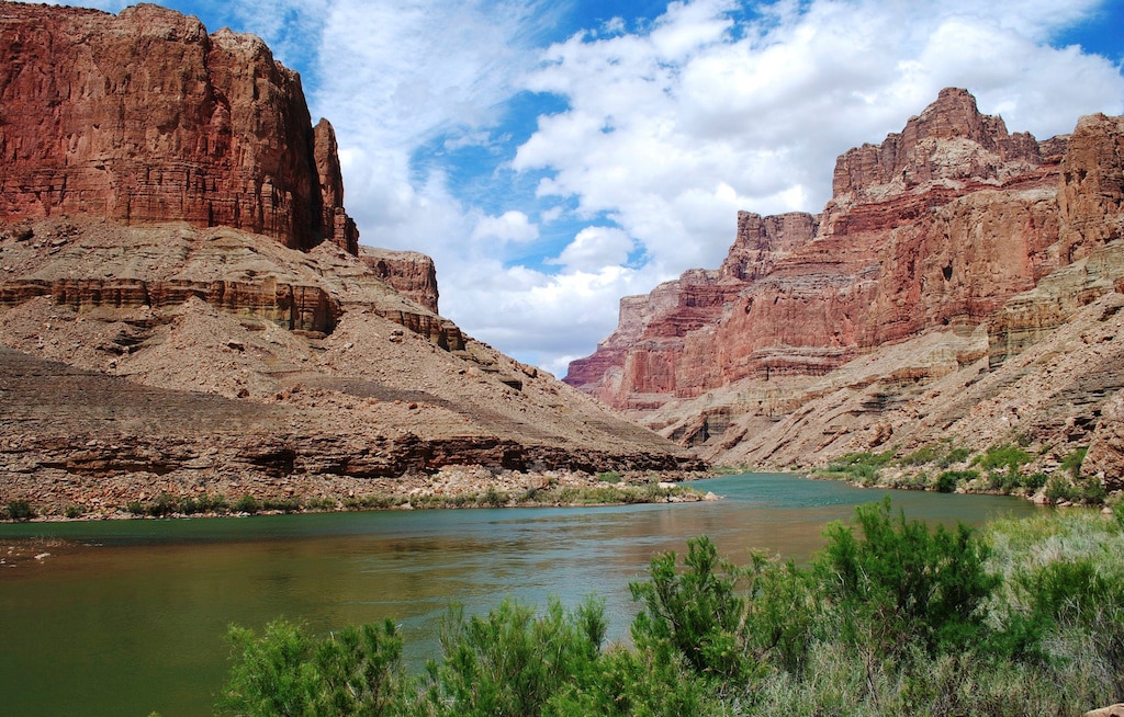 (Confluence Partners, LLC via AP) This undated photo provided by Confluence Partners, LLC, shows a view upstream on the Colorado River in the Grand Canyon at the site for a proposed aerial tram. Navajo Nation lawmakers will consider a plan Tuesday, Oct. 31, 2017, to build an aerial tram to carry visitors to the bottom of the Grand Canyon. The special session in Window Rock, Ariz., will be the first time the full Tribal Council takes up the bill.