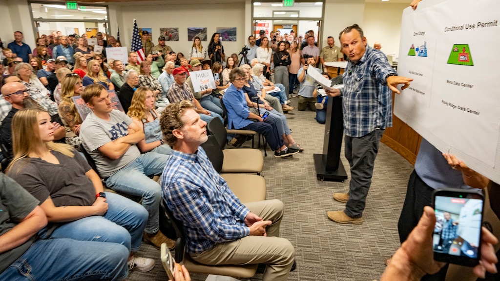 (Rick Egan | The Salt Lake Tribune) Taylor Flake, whose home is across the street from the proposed data center site, speaks in opposition to the project at the Juab County Commission meeting at Rocky Ridge Town Hall on Sept. 8, 2026.