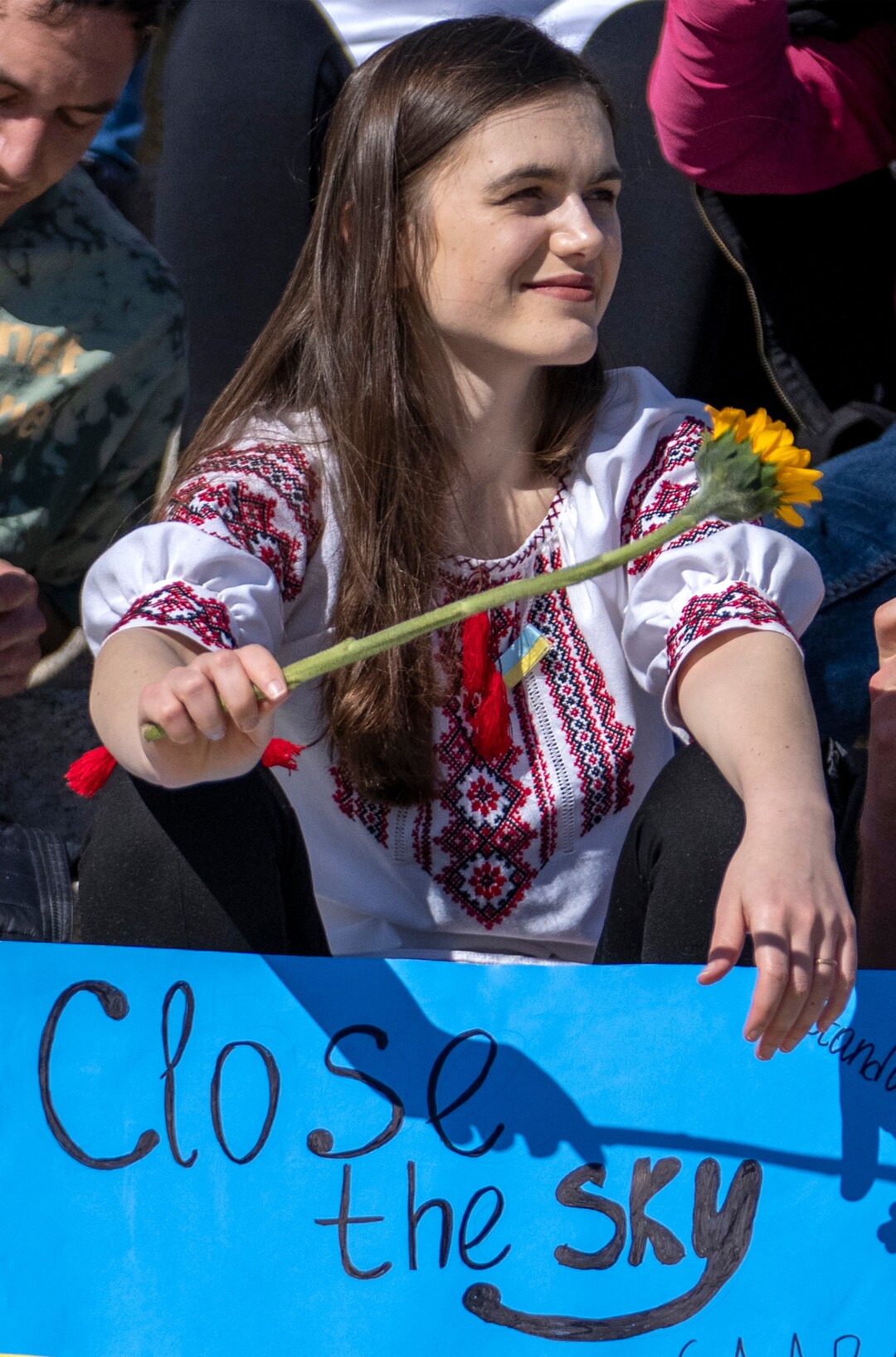 (Rick Egan | The Salt Lake Tribune) Albina Rasmussen listens to speakers as she gathers on the Capitol steps for a protest against Russia's invasion of Ukraine, organized by the Utah Ukrainian association, on Saturday, March 12, 2022.