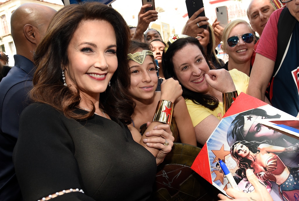 (Associated Press photo) Lynda Carter, star of the television series "Wonder Woman," signs autographs following a ceremony honoring her with a star on the Hollywood Walk of Fame on Tuesday, April 3, 2018, in Los Angeles. Carter has joined the lineup of celebrities coming to FanX Salt Lake Comic Convention, April 19-20, 2019.