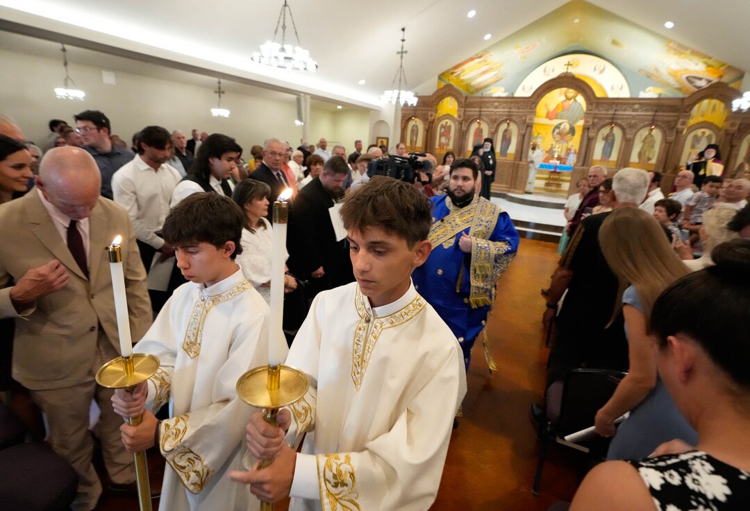 (Francisco Kjolseth  |  The Salt Lake Tribune) Altar boys Nicholas and Sam Simos lead a procession at St. Anna Greek Orthodox Church in Sandy during opening services on Saturday, July 13, 2024.