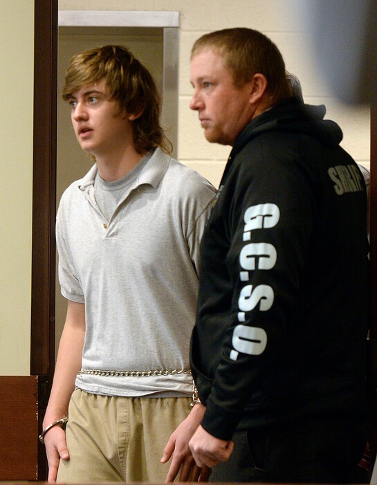 Al Hartmann | The Salt Lake Tribune
Clay Brewer, 17, of Snowflake, Arizona is escorted into Judge Wallace Lee's 6th District Court in Panguitch Thursday Dec. 29, 2016, to make his first court appearance. He is being charge as an adult with first-degree-felony counts of aggravated murder, attempted aggravated murder and aggravated robbery, as well as a third-degree-felony count of failure to stop at the command of police, and misdemeanor counts of tampering with evidence, reckless endangerment, theft and reckless driving. He is accused of killing 61-year-old Jimmy Woolsey during an attack at Turn-About Ranch School, located north of Escalante.