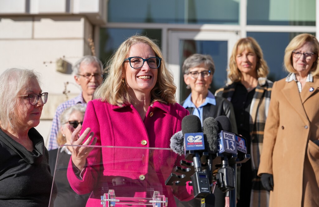 (Chris Samuels | The Salt Lake Tribune) Emma Addams, co-executive director of Mormon Women for Ethical Government, speaks as plaintiffs from a redistricting lawsuit hold a news conference outside Third District Court in Salt Lake City, Tuesday, Nov. 11, 2025. A judge selected a map proposed by the plaintiffs to be the 2026 congressional boundaries.