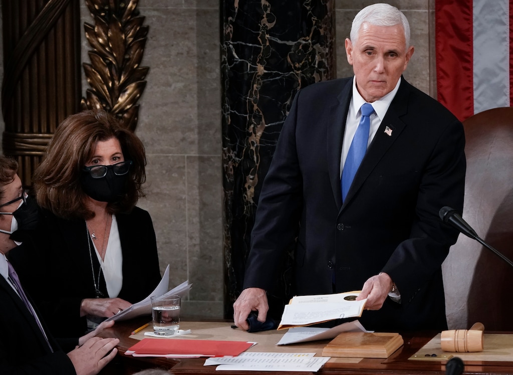 (AP Photo/J. Scott Applewhite)
In this Jan. 6 photo, Senate Parliamentarian Elizabeth MacDonough, second from left, works beside Vice President Mike Pence during the certification of Electoral College ballots in the presidential election, in the House chamber at the Capitol in Washington. Shortly afterward, the Capitol was stormed by rioters determined to disrupt the certification.