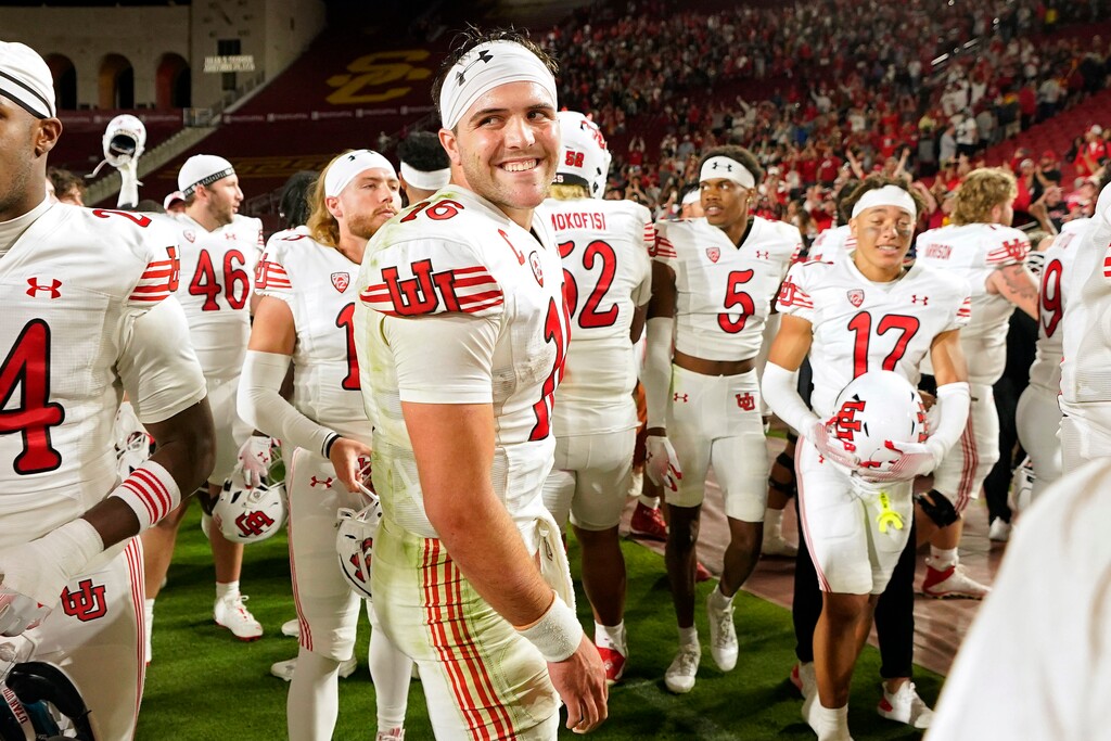(Mark J. Terrill | AP) Utah quarterback Bryson Barnes smiles after Utah defeated Southern California 34-32 on Saturday in Los Angeles.